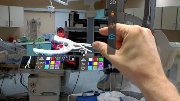 Figure illustrates the concept of intraprocedural mixed reality interactive visualization of 3D CTA data segmentation of aorta and ductus) . Computer demonstration is planned as a presentation add-on.